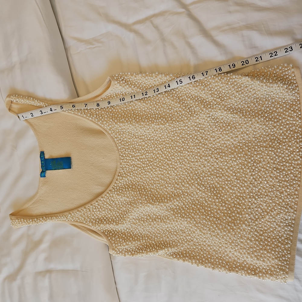 Embellished sewn on pearl tank top.